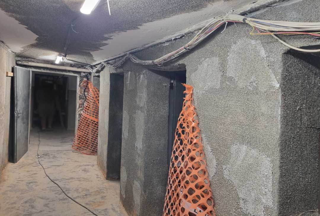 Reinforcement of main wall bays with pultruded bars and carbon fiber fabrics installation with associated carbon flake connections